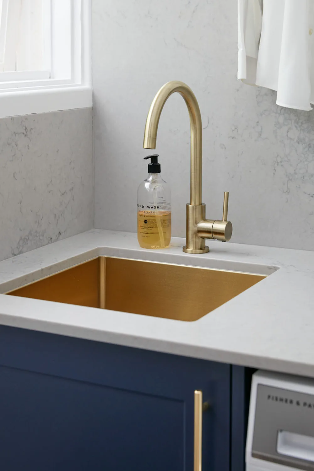 A gold Lavello sink was one of Jen's splurge items.