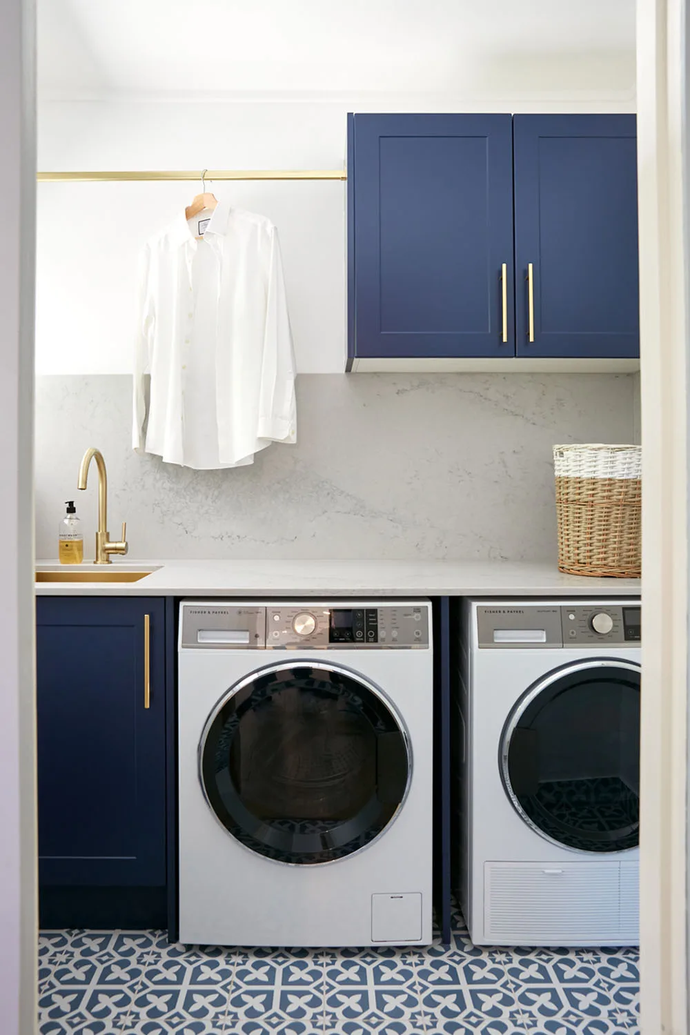 Navy laundry with patterned floor tiles