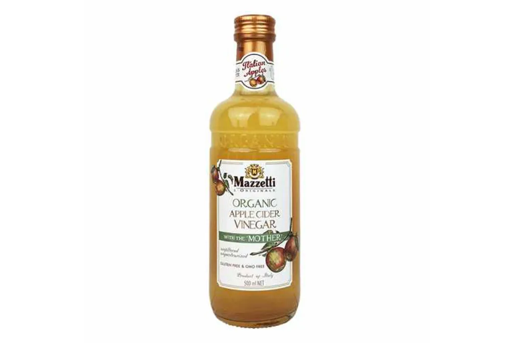 Organic apple cider vinegar in a glass bottle