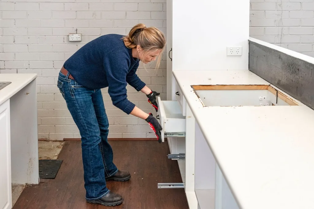 woman putting in drawers
