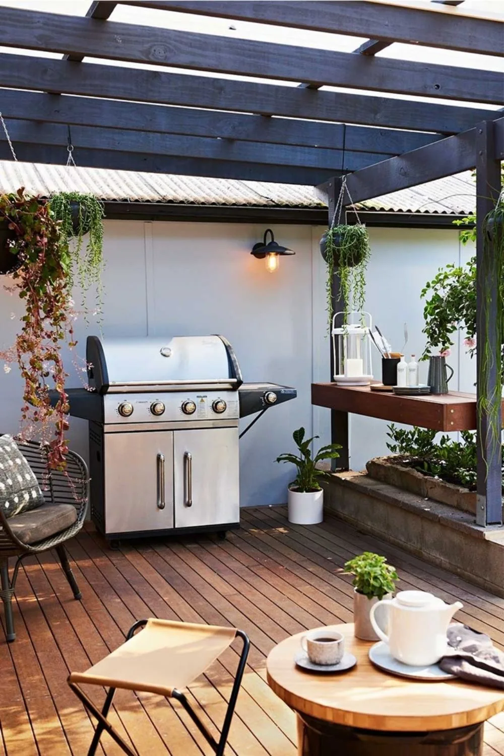 Stainless steel barbecue on a timber deck