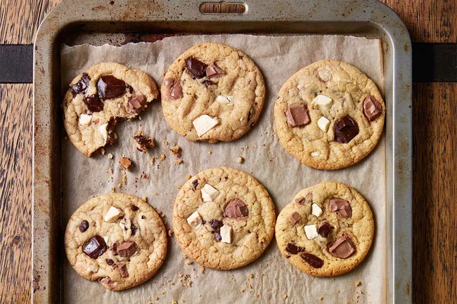 Choc chip biscuits on a baking tray