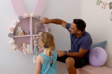 Adam makes a bunny ear shelf
