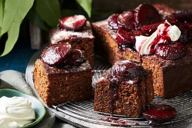 Chai spiced walnut and treacle cake with baked plums