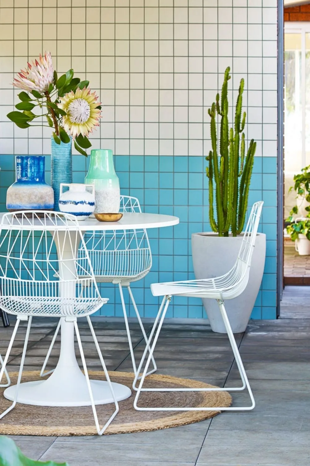 Blue and white tiled feature wall in a converted car port