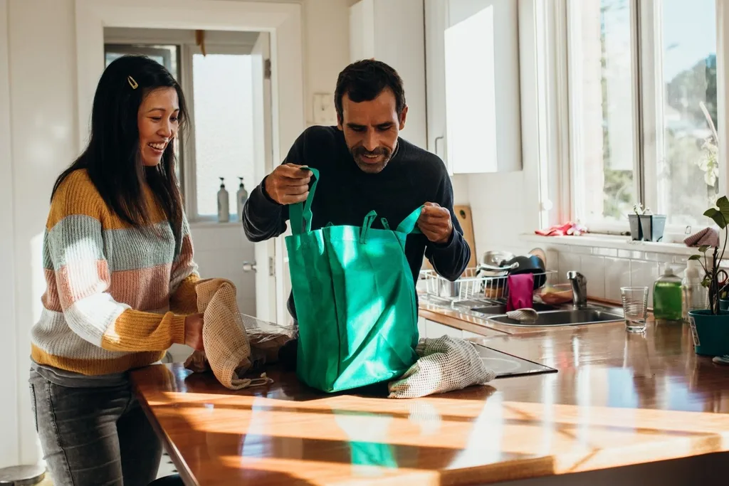 Couple unpacking groceries