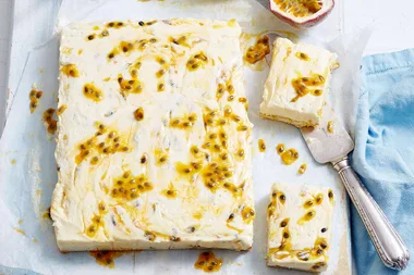 Passionfruit swirl cheesecake slice