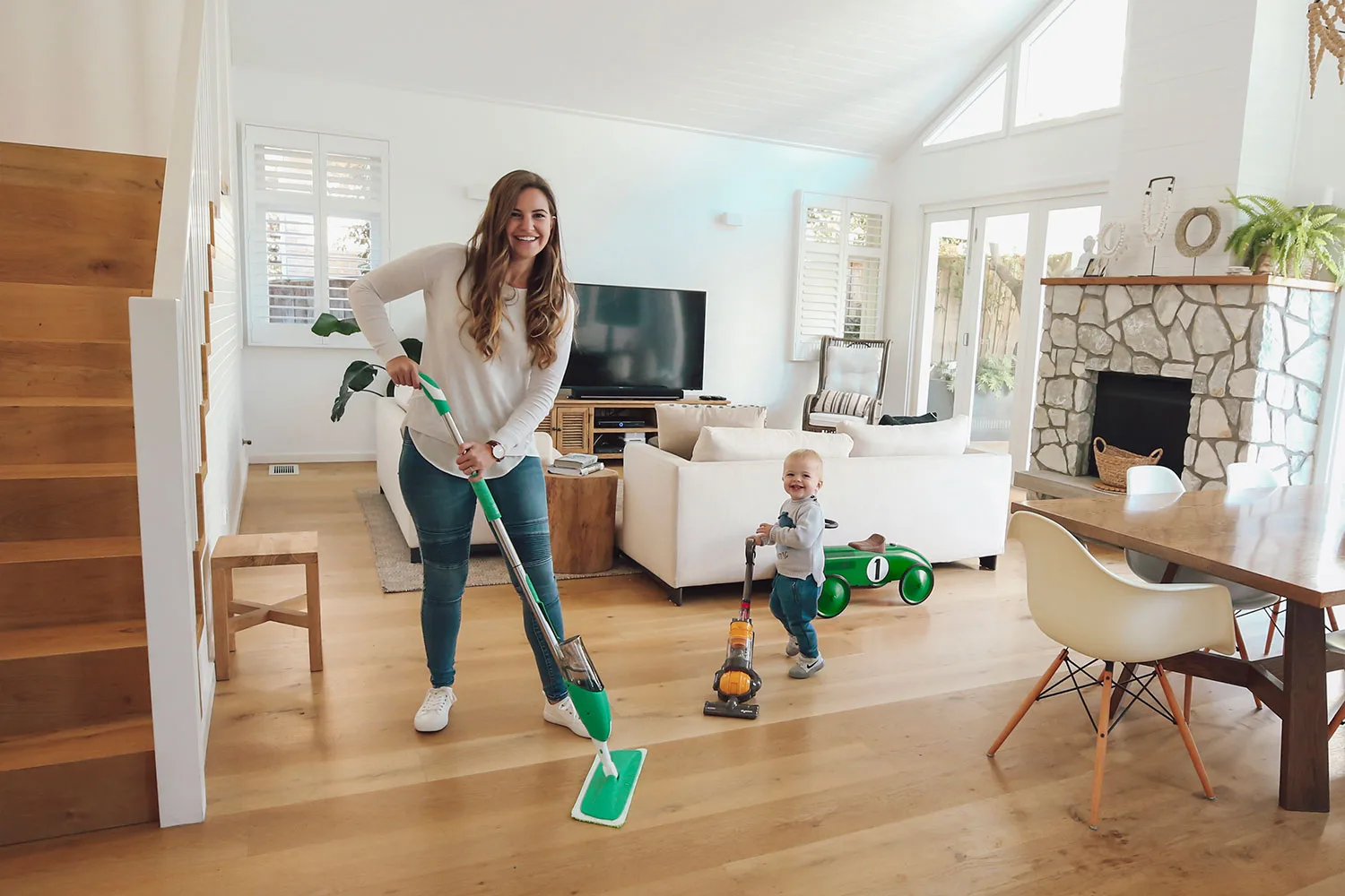 Woman cleaning floor with Koh mop