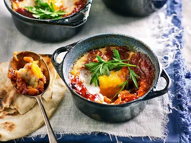 Spanish style baked eggs with chorizo and smoky beans