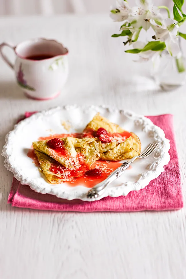 Coconut pancakes with homemade raspberry sauce
