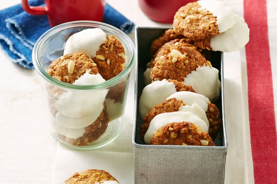 Macadamia, lime and white chocolate Anzac biscuits Recipe | Better Homes &amp; Gardens Australia