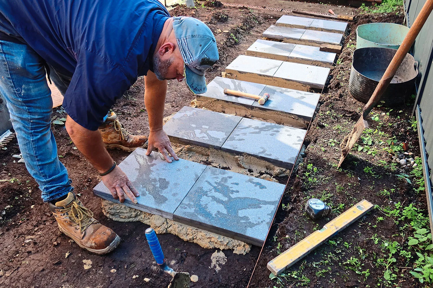 Lay the row of pavers