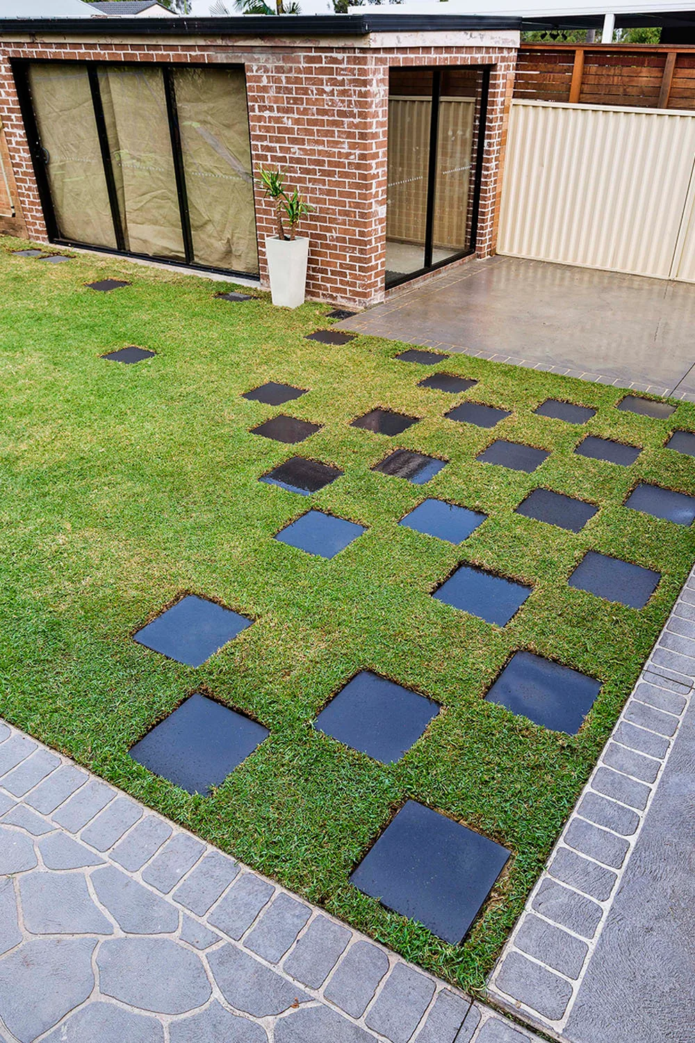 Lawn with checkerboard pavers