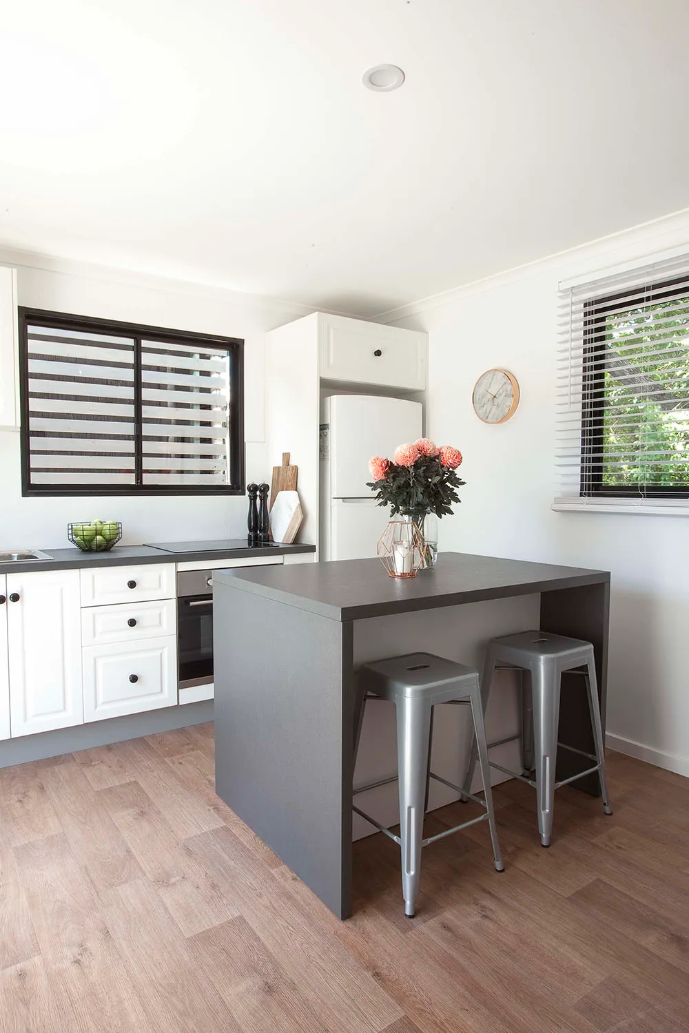 Budget small galley kitchen with portable island bench