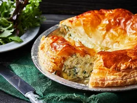 Cheese and herb pie on a dish