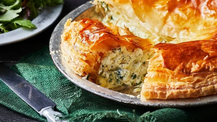 Cheese and herb pie on a dish
