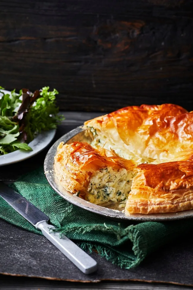 Cheese and herb pie on a dish