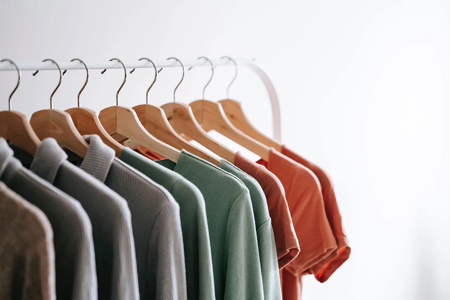 Shirts on wooden coat hangers