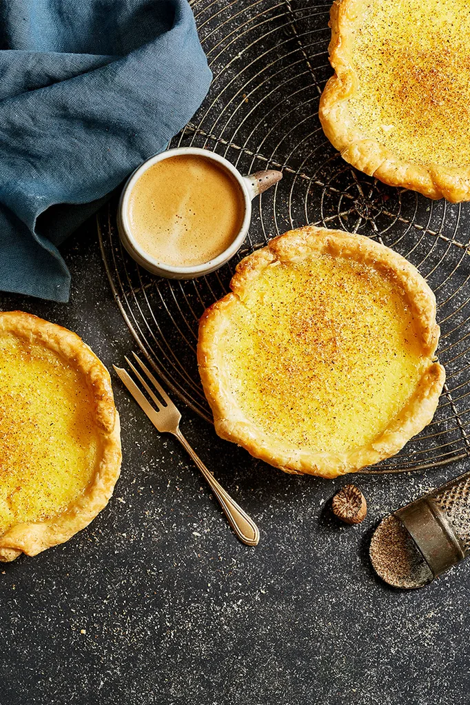 Baked custard tart on a wire cooling rack