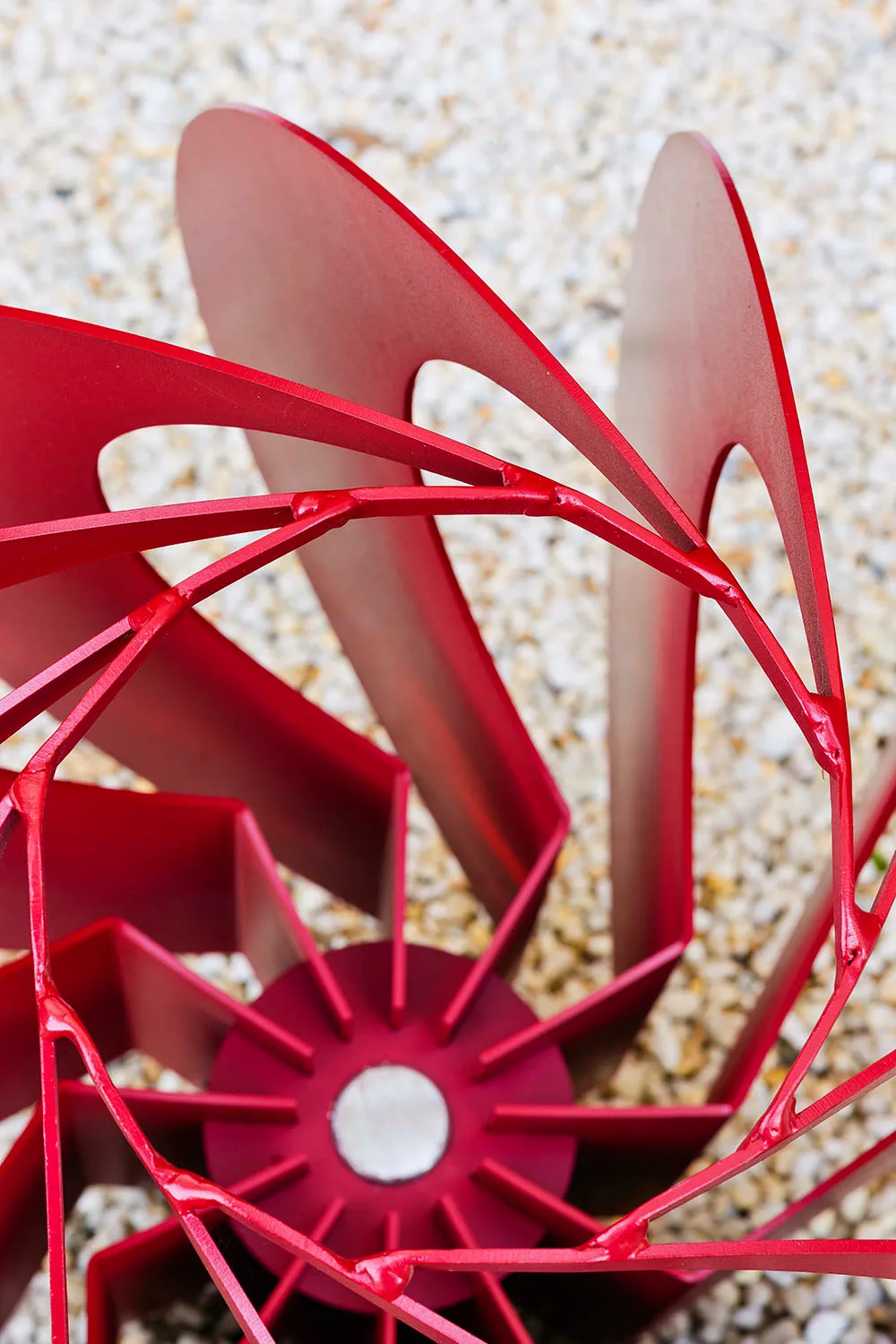Red garden sculpture close up
