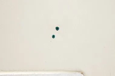 How to plug holes in brick walls
