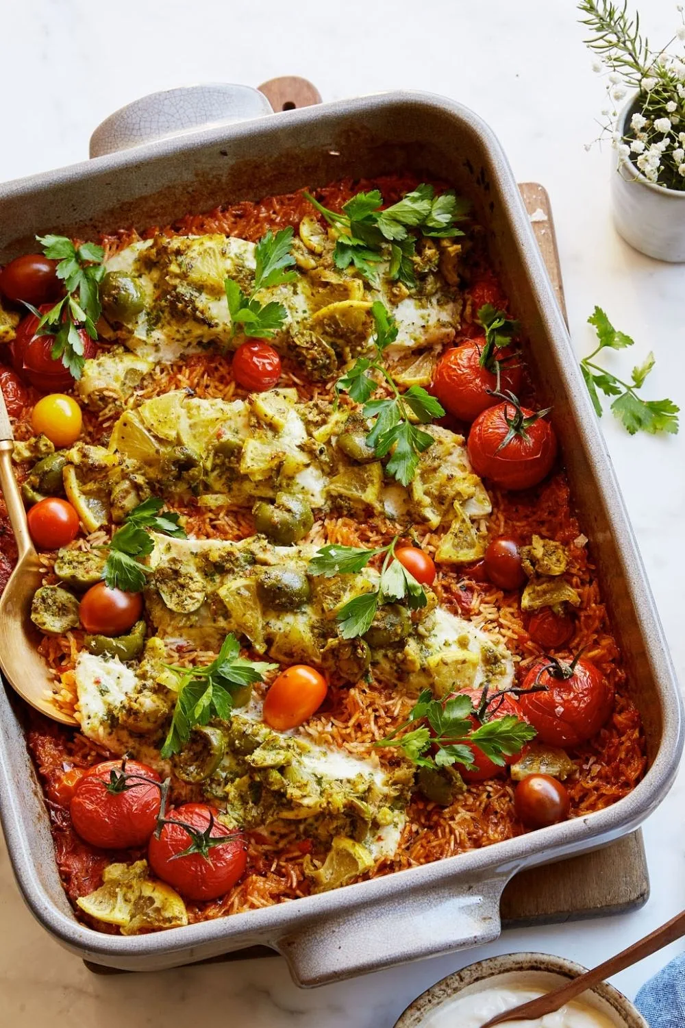 Roasted fish and spiced rice pilaf tray bake