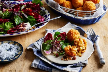 Crispy cheesy arancini with radicchio salad