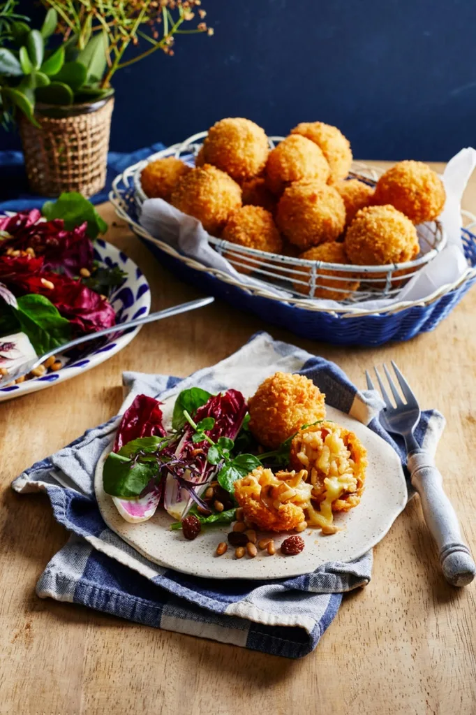 Crispy cheesy arancini with radicchio salad