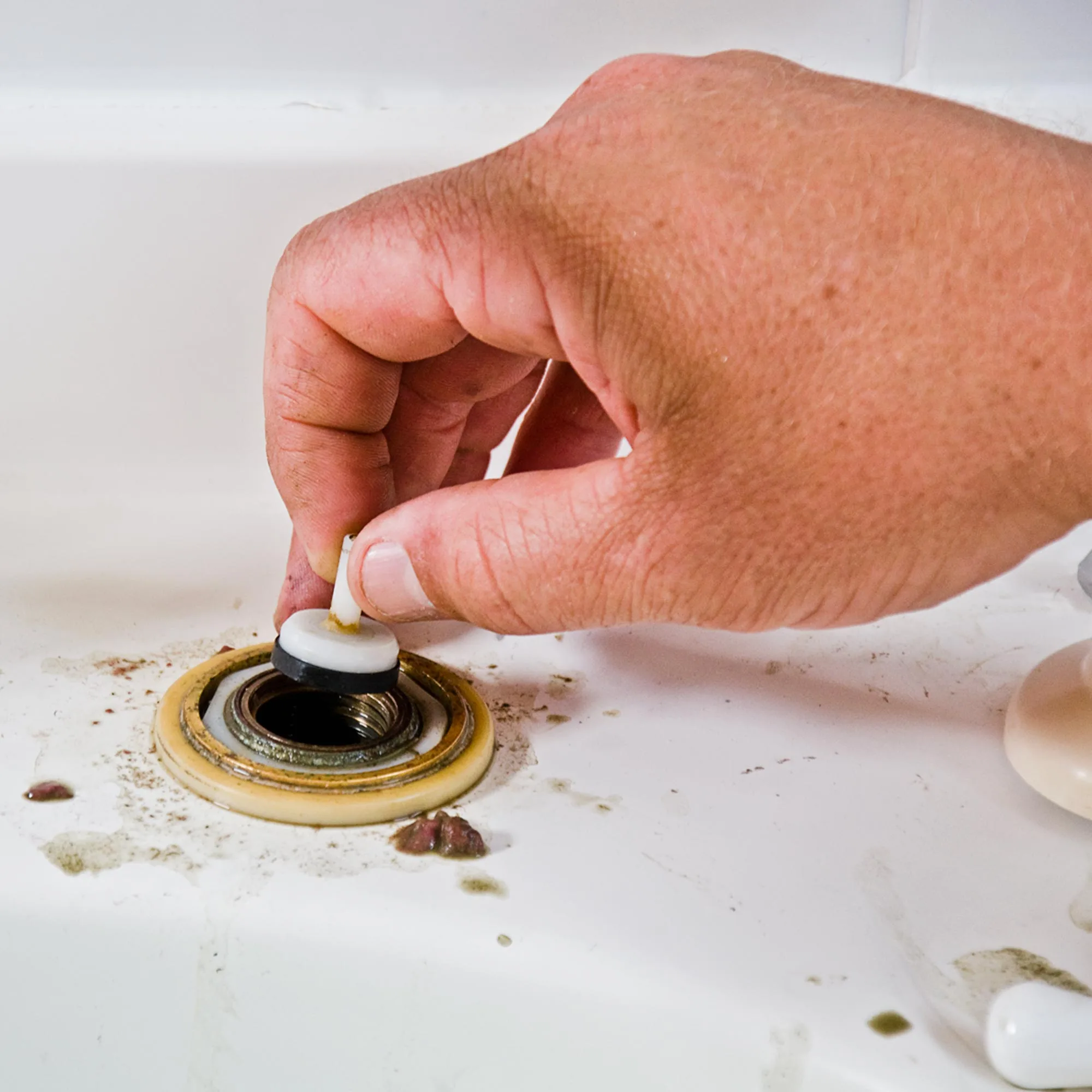 The jumper valve in a tap has a washer attached to its base.