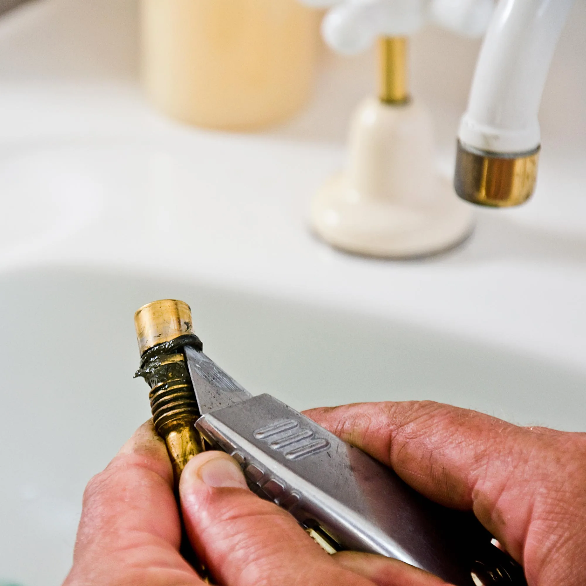 The O-ring on a tap can be either prised off or cut with a utility knife.