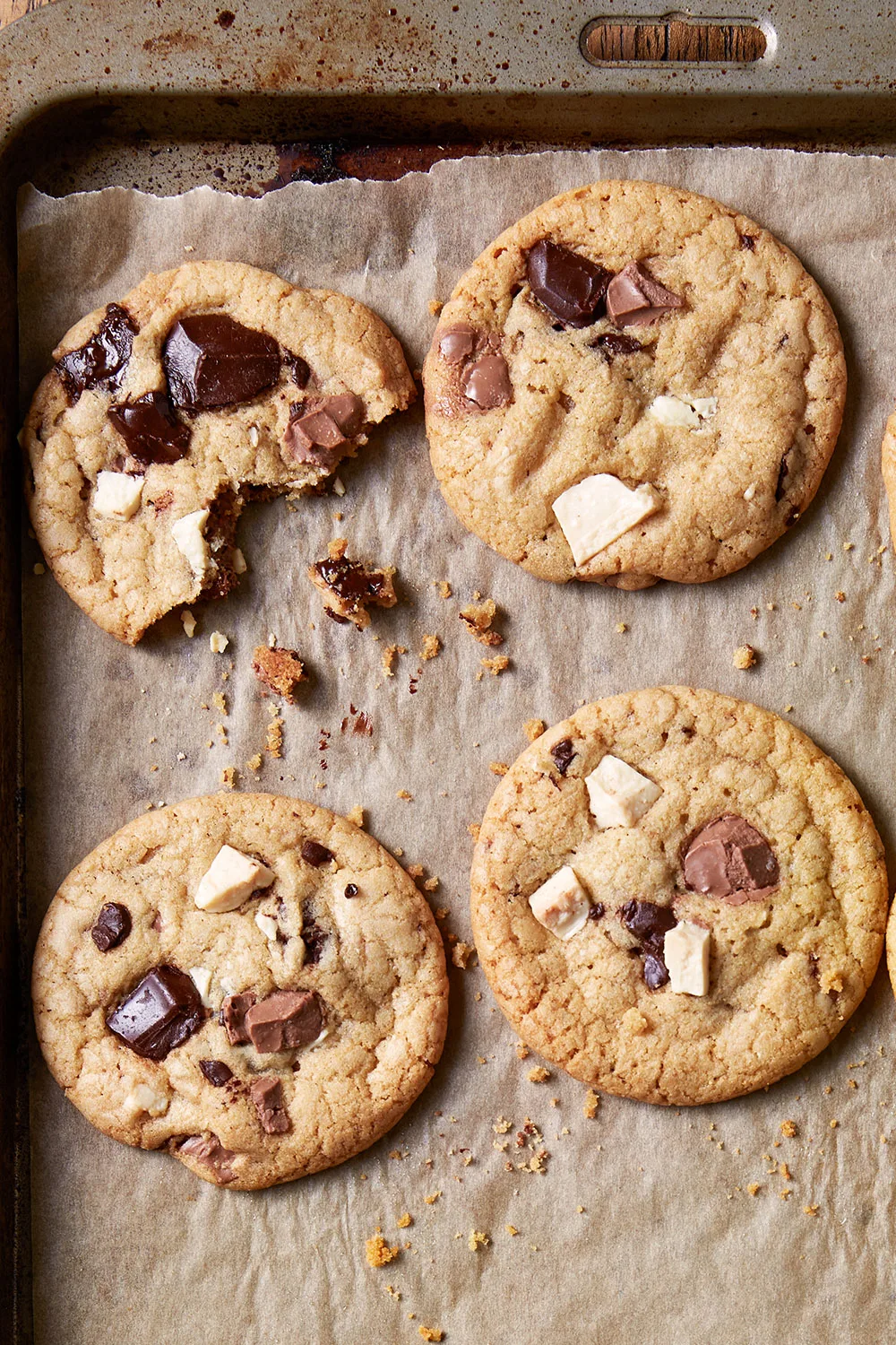 chocolate biscuits with white, milk and dark chocolate chunks in them