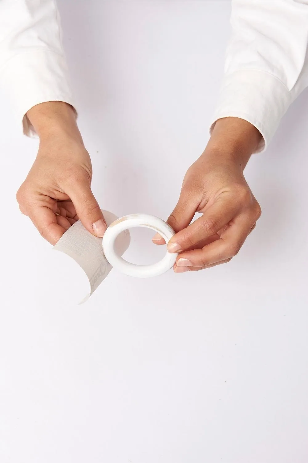 Cut out cork circle using scissors.