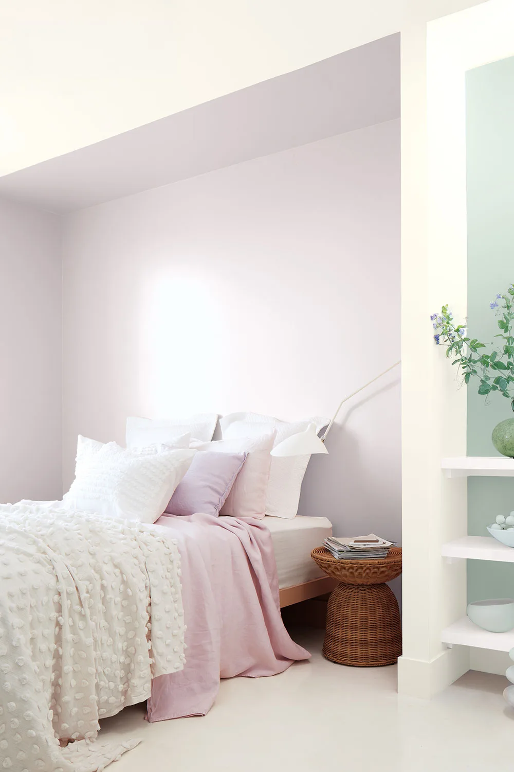 Bedroom with pink and sage green walls