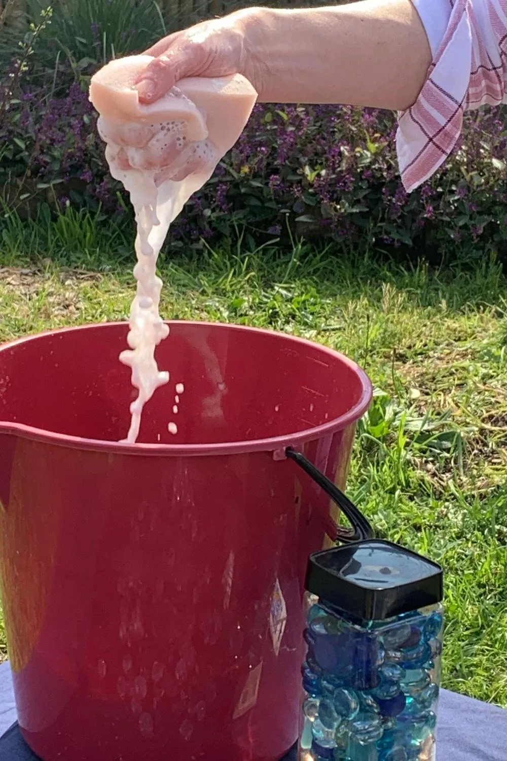 Step 6. Rinse the mosaic bird bath as many times as you need to remove excess grout.
