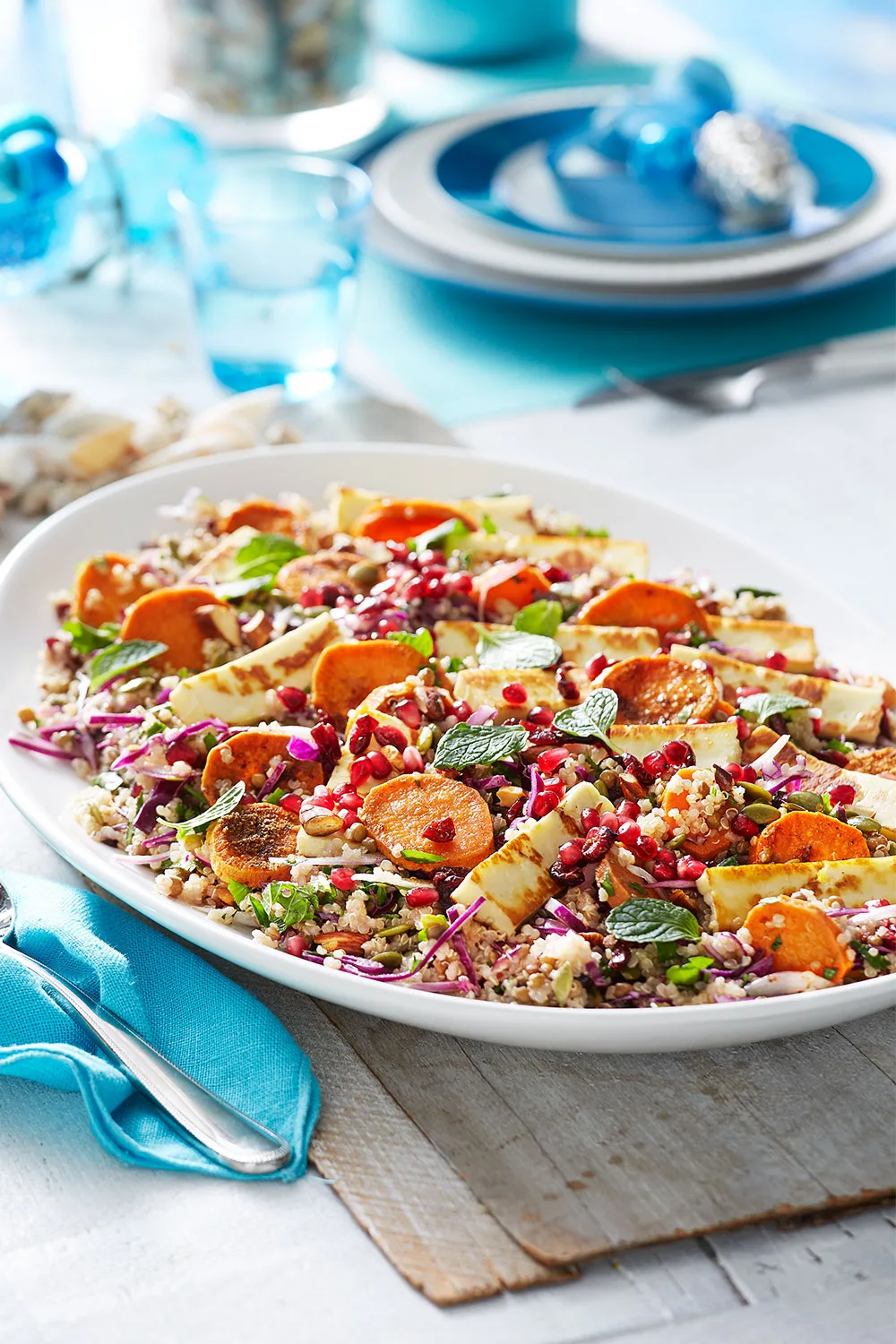 Quinoa, lentil and sweet potato salad with pan-fried haloumi
