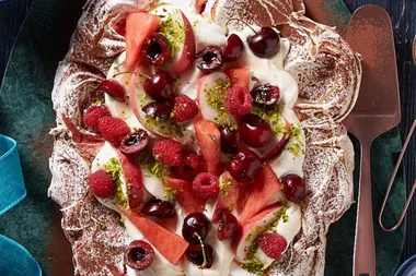 Pavlova with tipsy festive fruit salad