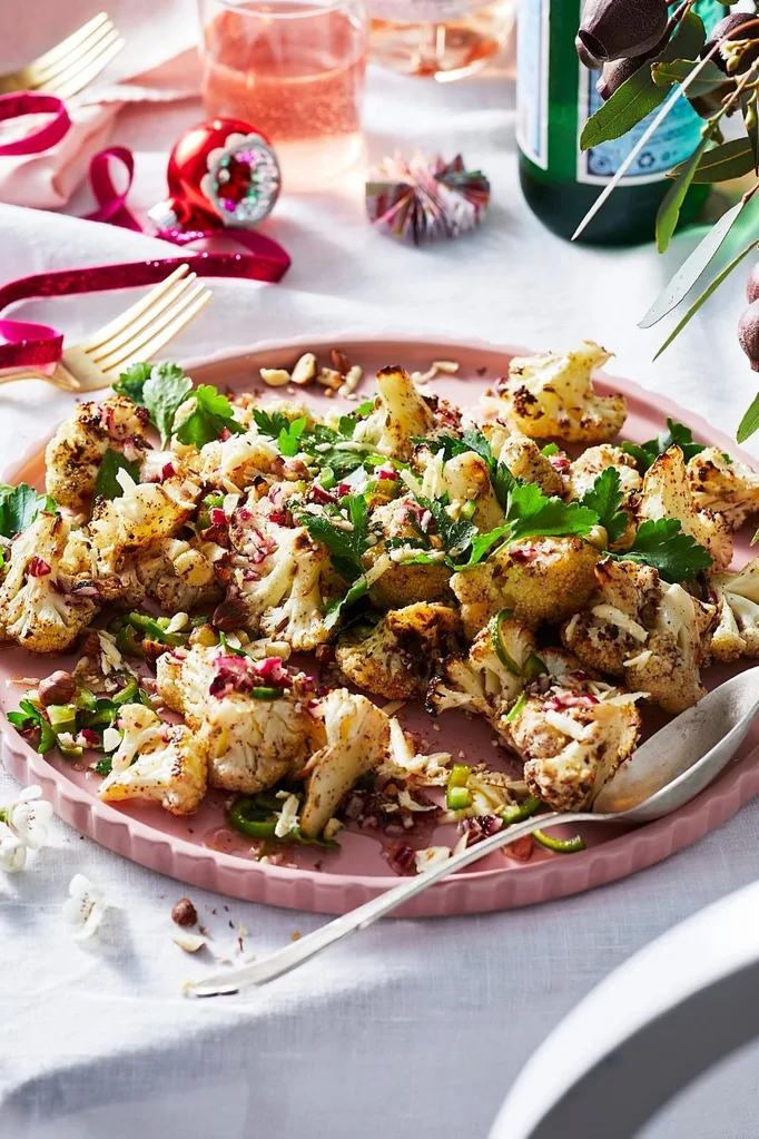 Baked cauliflower with haloumi, dukkah and honey