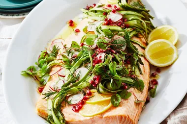 Salmon with asparagus radish and pomegranate dressing