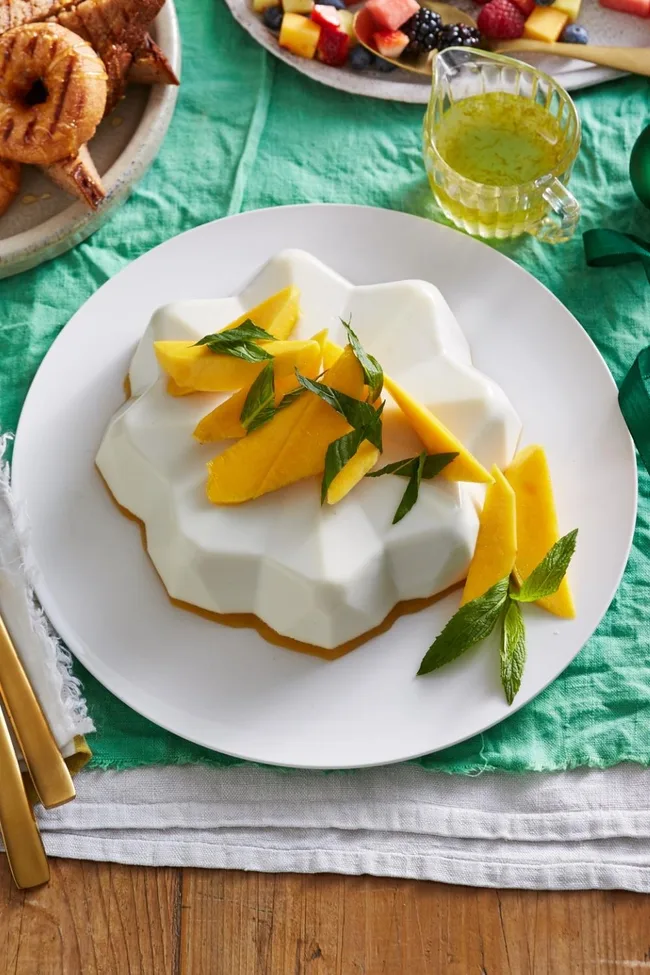 Coconut and white chocolate panna cotta with mango jelly