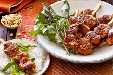 Barbecued pork skewers and noodles