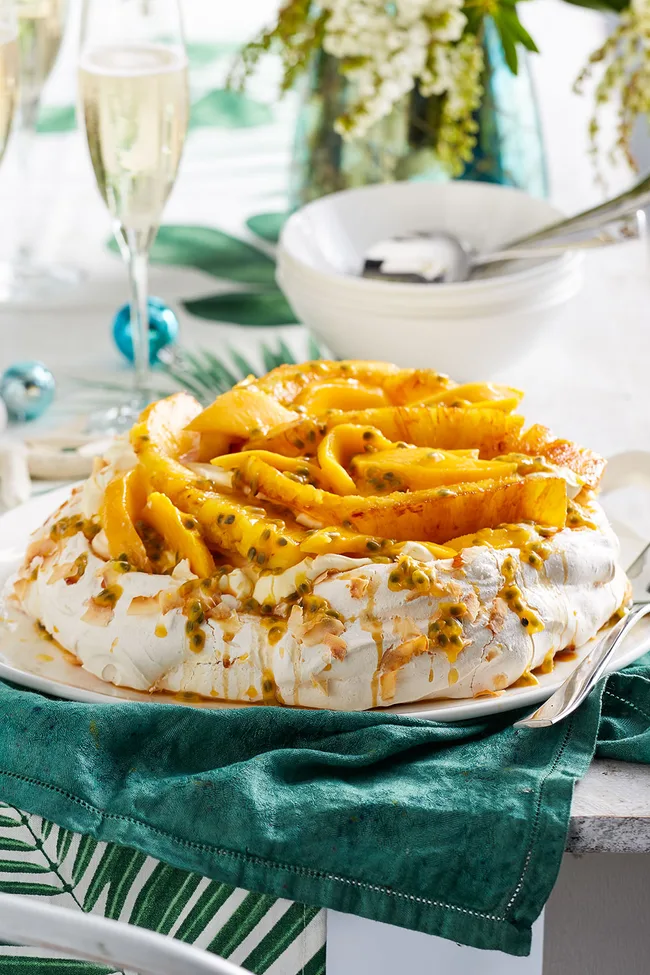 Caramelised pineapple, mango and coconut pavlova