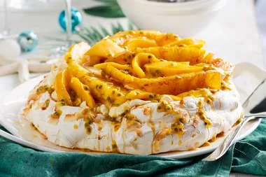 Caramelised pineapple, mango and coconut pavlova