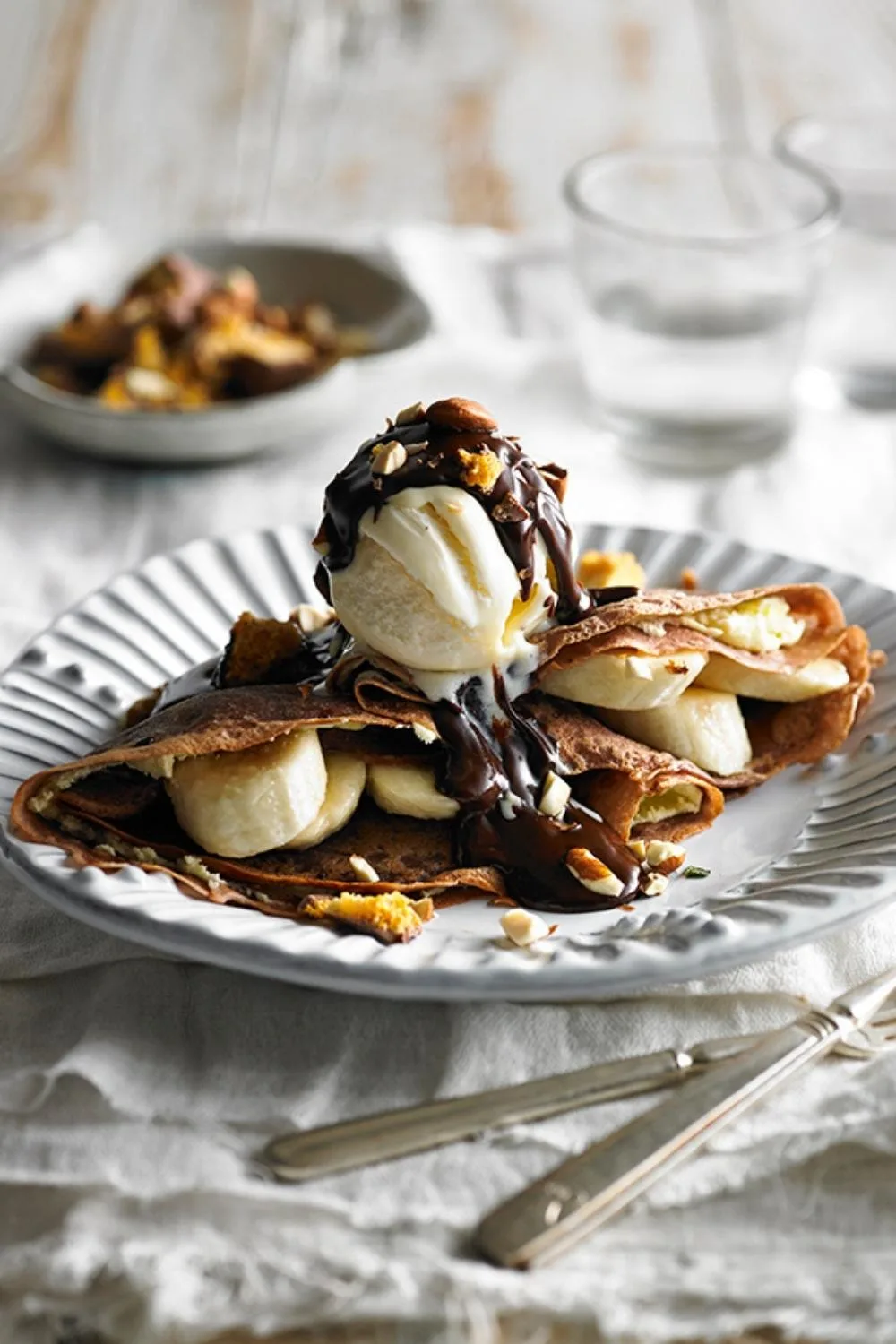 Rich chocolate crepes with mascarpone and banana