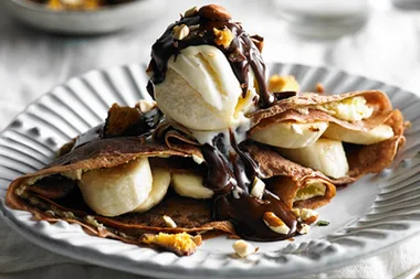 Rich chocolate crepes with mascarpone and banana