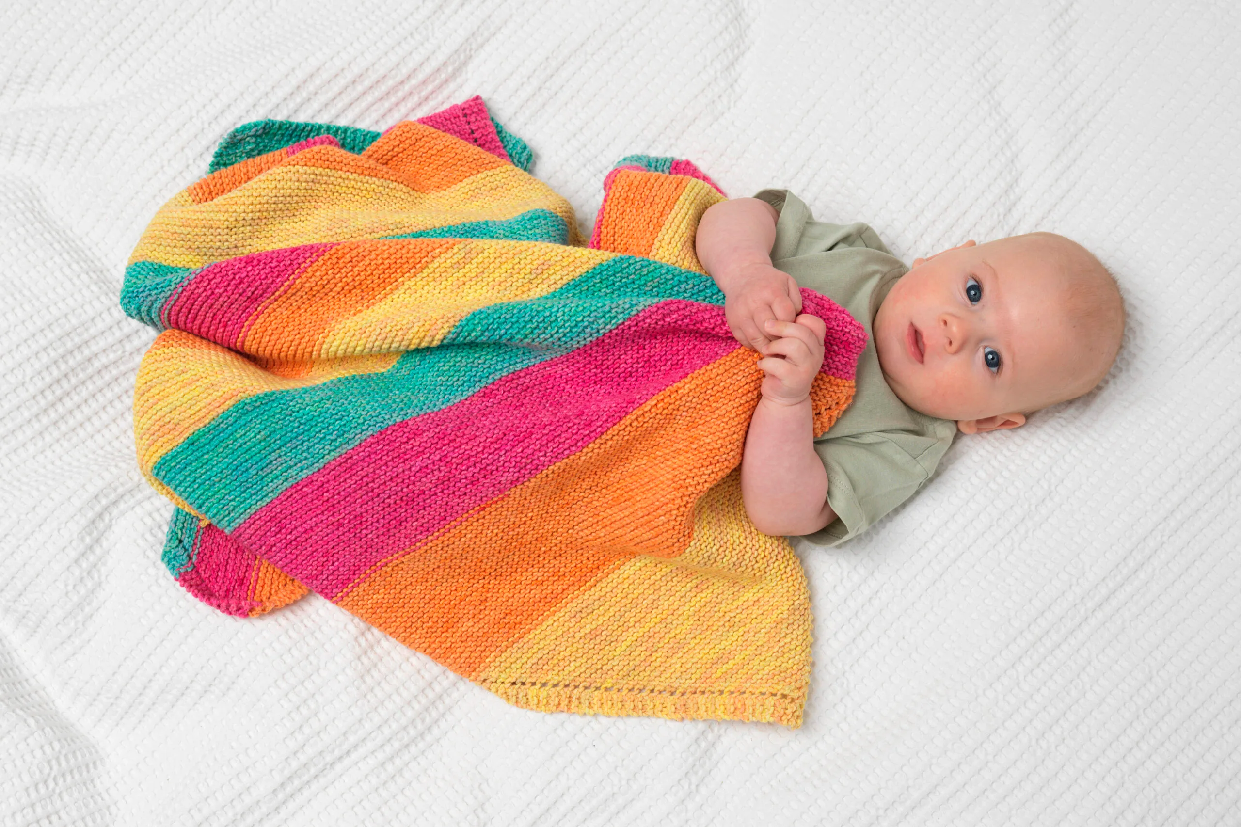 How to knit a bright and colourful baby blanket