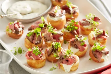 Mini Yorkshire puddings with rare beef and horseradish cream