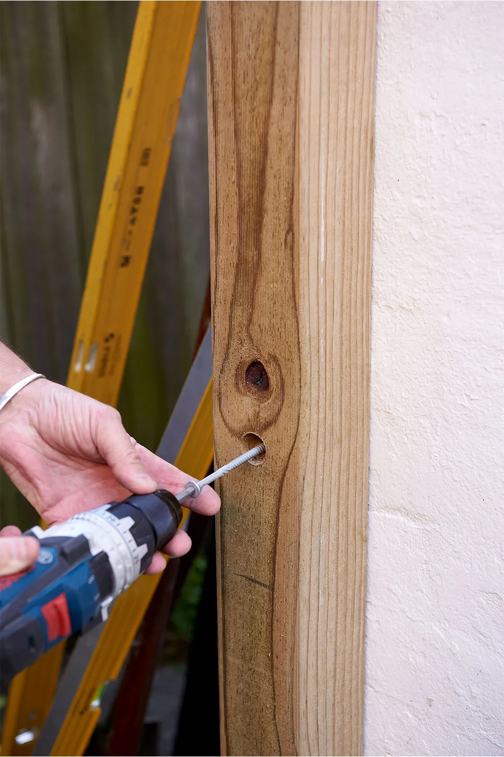 Screw holes into posts