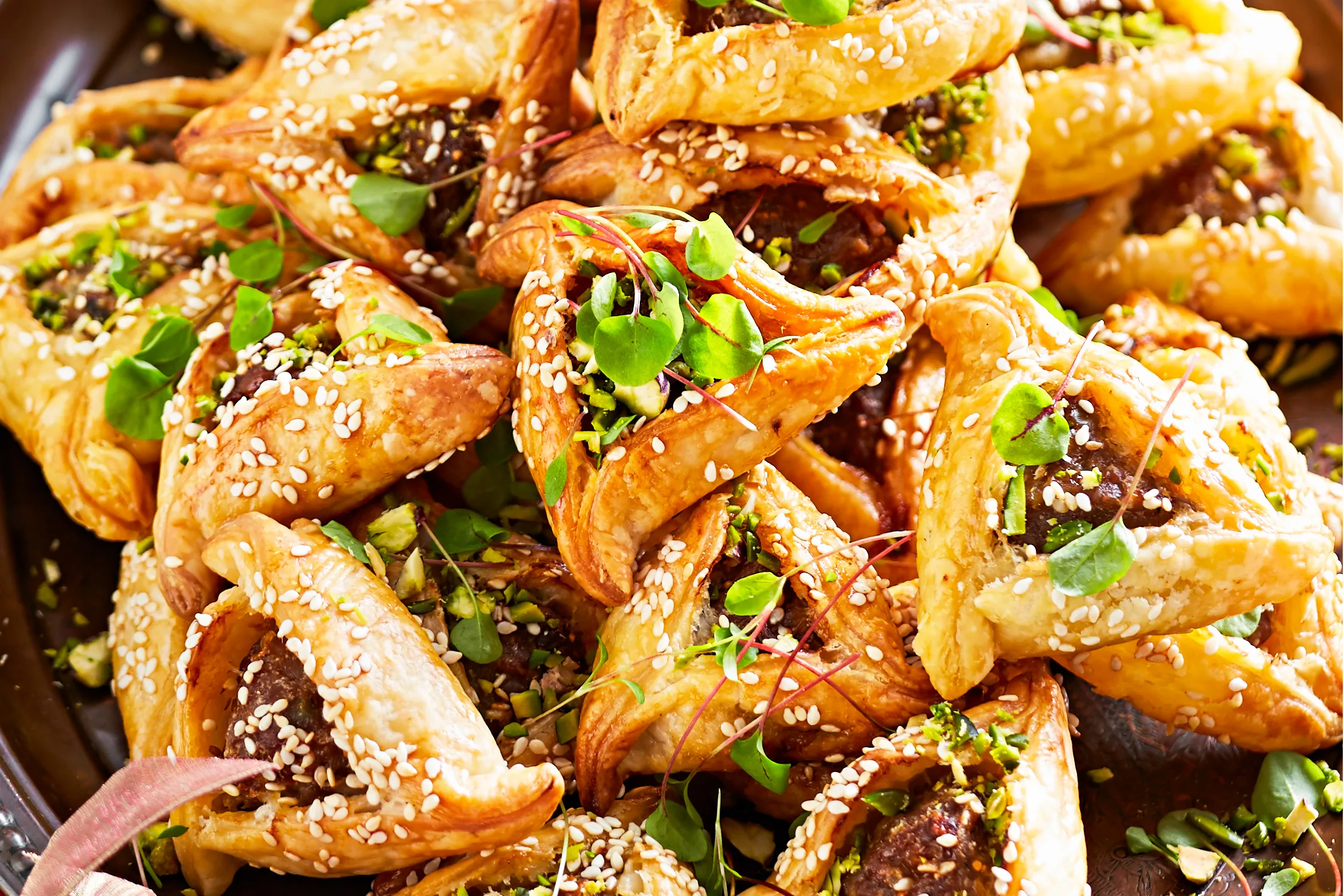 Beef, fig and pistachio sausage pies