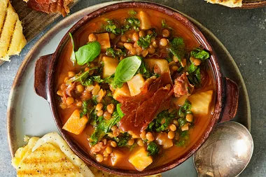 Prosciutto lentil and celeriac soup with polenta-provolone toasts