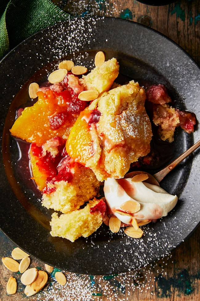 Slow cooker peach melba cobbler